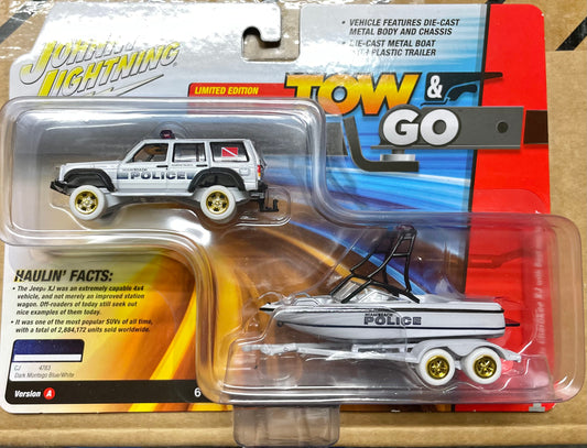 Johnny Lightning 1:64 die cast Police Jeep Cherokee XJ with Boat and Trailer CHASE